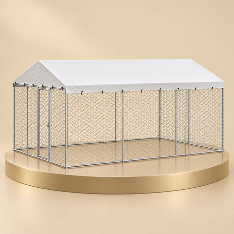 Covered outdoor dog kennel with a galvanized chain-link frame and white peaked canopy on a champagne plinth