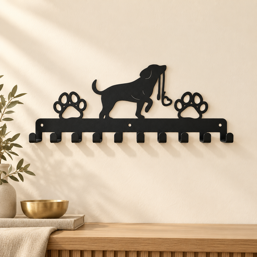 Empty black metal rack with ten hooks and dog and paw silhouettes mounted above a wooden console.