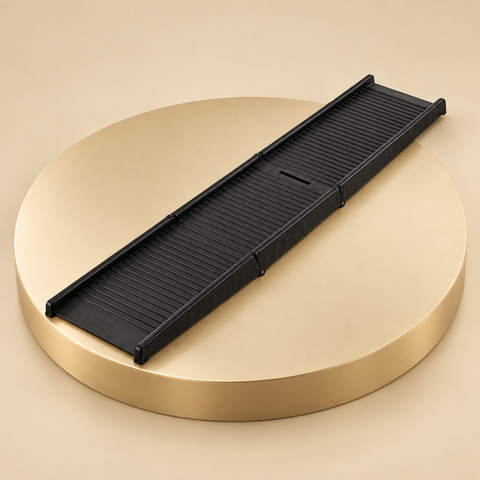 Tri-fold dog ramp in black with a ridged surface and side rails on a round champagne plinth
