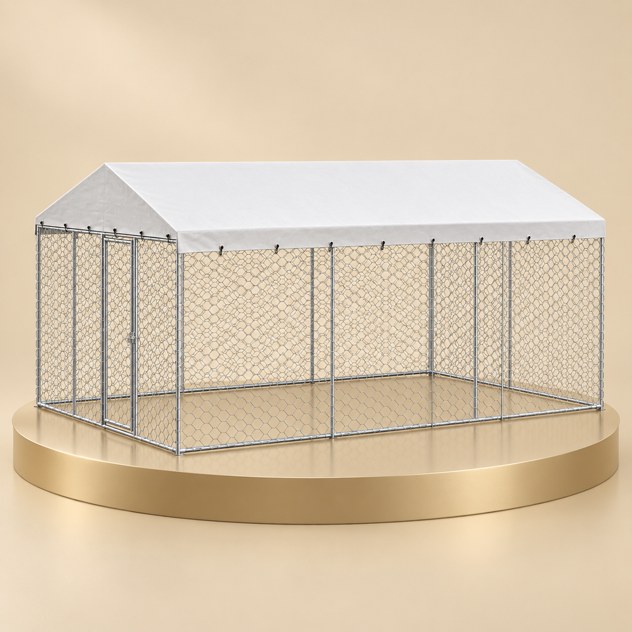 Covered outdoor dog kennel with a galvanized chain-link frame and white peaked canopy on a champagne plinth