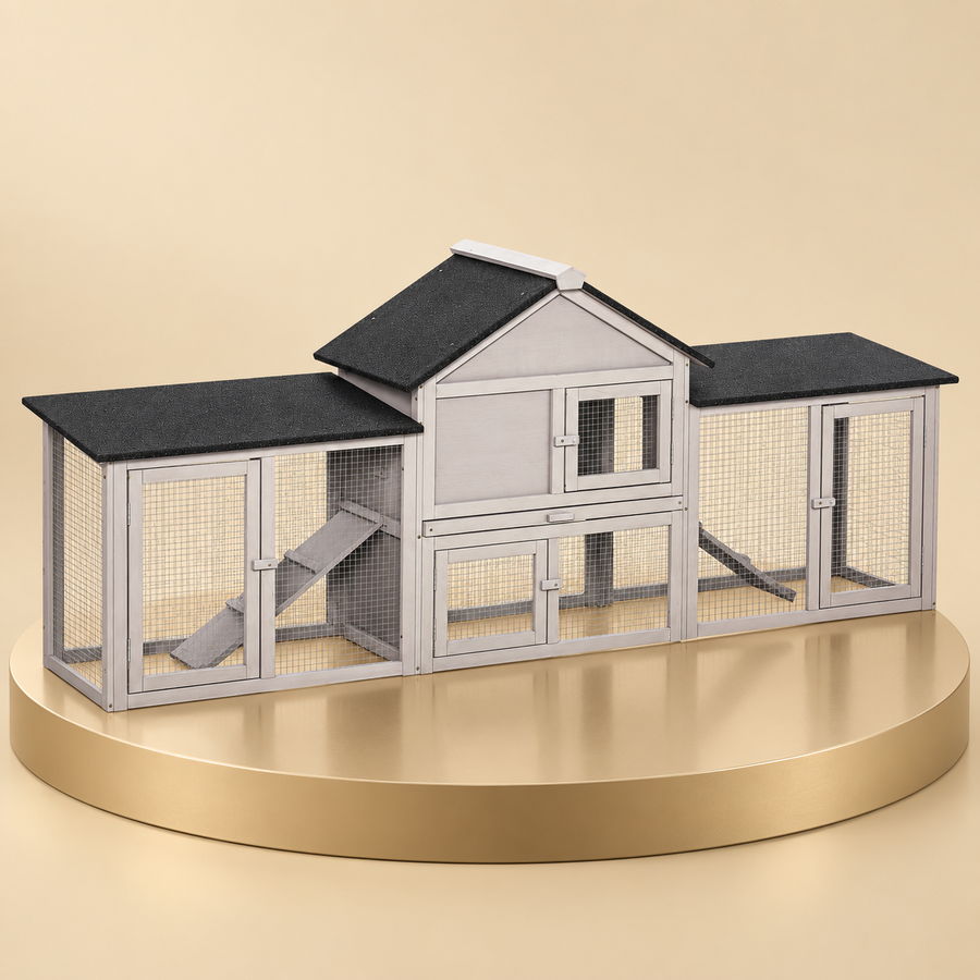 Two-story gray wooden rabbit hutch with a raised center house and two side runs on a champagne plinth